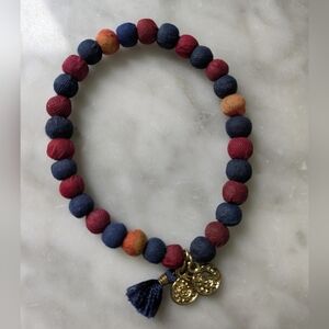 NWOT Navy Blue & Red Beaded Bracelet with Gold Charms & Navy Blue Tassle